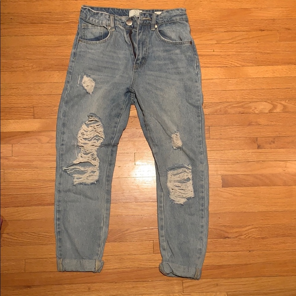 medium wash mom jeans with holes from Cotton On